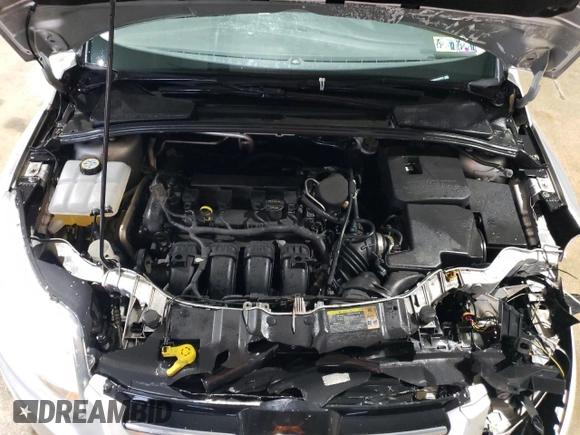 2012 Ford Focus SE z VIN 1FAHP3K25CL246694, wystawiony jako Copart lot #59591645 z przebiegiem 222 330 mil mil oraz Szkoda całkowita • Salvage title. Historia ofert i sprzedaży dostępna na DreamBid. Obrazek 11.