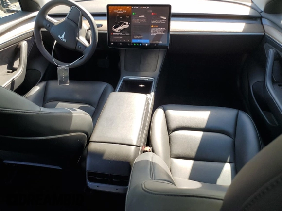 2023 Tesla Model 3 with VIN 5YJ3E1EA7PF450343, listed as a Copart auction lot 52446595 with 36,137 mi miles and Salvage Title. Bid and sale history available at DreamBid. Image 8.