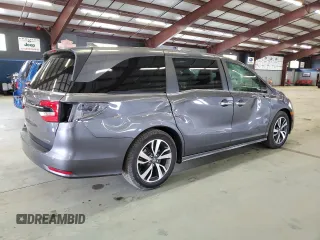 2022 Honda Odyssey Touring with VIN 5FNRL6H83NB061024, listed as a Copart auction lot 55073695 with 31,440 mi miles and Salvage title. Bid and sale history available at DreamBid. Image 3.