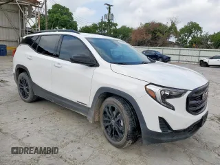 2020 GMC Terrain SLE with VIN 3GKALMEV9LL273196, listed as a Copart auction lot 57219035 with 128,763 mi miles and Salvage title. Bid and sale history available at DreamBid. Image 4.