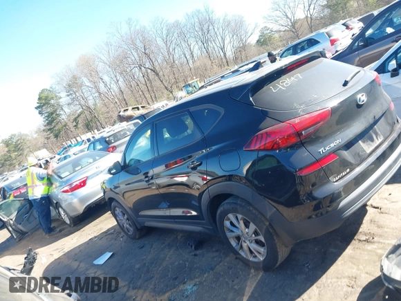 2021 Hyundai Tucson SE with VIN KM8J23A40MU334847, listed as a IAAI auction lot 41817556 with 63,000 mi miles and . Bid and sale history available at DreamBid. Image 14.