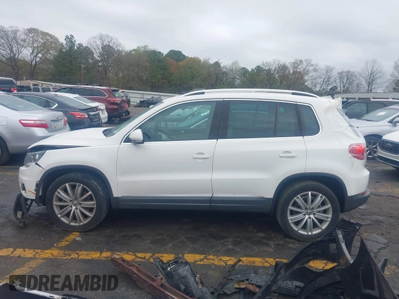 2012 Volkswagen Tiguan SEL with VIN WVGAV7AX0CW507942, listed as a IAAI auction lot 41854498 with 177,117 mi miles and . Bid and sale history available at DreamBid. Image 14.