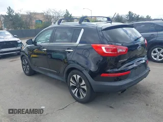 2013 Kia Sportage SX with VIN KNDPCCA61D7385219, listed as a IAAI auction lot 41945345 with 112,471 mi miles and . Bid and sale history available at carsss.com. Image 3.