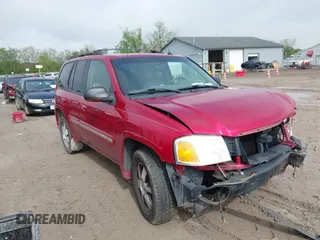2004 GMC Envoy SLT z VIN 1GKDT13S542158165, wystawiony jako IAAI lot #42182753 z przebiegiem 185 628 mil mil oraz . Historia ofert i sprzedaży dostępna na DreamBid. Obrazek 1.