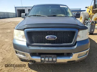 2005 Ford F-150 XLT with VIN 1FTPX14565NB32759, listed as a Copart auction lot 50522155 with 128,795 mi miles and Clean Title. Bid and sale history available at carsss.com. Image 5.