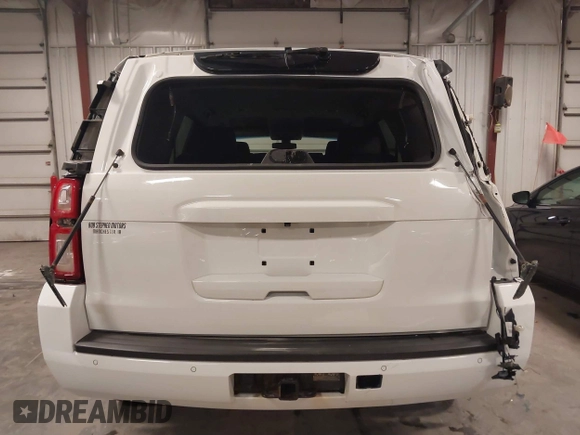 2015 Chevrolet Tahoe Commercial with VIN 1GNSK2EC5FR688820, listed as a IAAI auction lot 41444813 with 206,244 mi miles and . Bid and sale history available at DreamBid. Image 17.