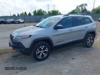 2015 Jeep Cherokee Trailhawk z VIN 1C4PJMBS5FW615313, wystawiony jako IAAI lot #42250873 z przebiegiem 148 008 mil mil oraz . Historia ofert i sprzedaży dostępna na DreamBid. Obrazek 17.