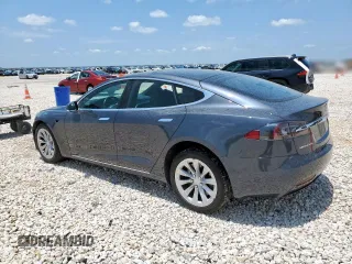 2017 Tesla Model S 60 with VIN 5YJSA1E15HF223354, listed as a Copart auction lot 60064725 with 60,403 mi miles and Salvage title. Bid and sale history available at DreamBid. Image 2.