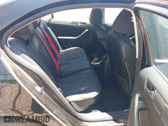 2014 Volkswagen Jetta TDI w/Premium with VIN 3VW3L7AJ6EM420044, listed as a IAAI auction lot 42569620 with 143,482 mi miles and . Bid and sale history available at DreamBid. Image 8.