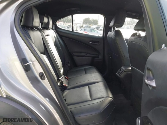 2021 Lexus UX with VIN JTHX3JBH4M2043263, listed as a IAAI auction lot 41671055 with 100,589 mi miles. Bid and sale history available at carsss.com. Image 8.