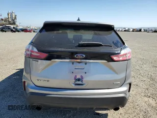 2020 Ford Edge SE с VIN 2FMPK3G98LBB25731, выставлен на аукционе Copart как лот 56233455 с пробегом 34 290 миль миль и Списание • Salvage title. История ставок и продаж доступна на DreamBid. Изображение 6.