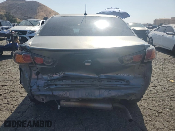 2014 Mitsubishi Lancer SE z VIN JA32V2FW3EU021070, wystawiony jako Copart lot #58239705 z przebiegiem 120 060 mil mil oraz Szkoda całkowita • Salvage title. Historia ofert i sprzedaży dostępna na DreamBid. Obrazek 6.