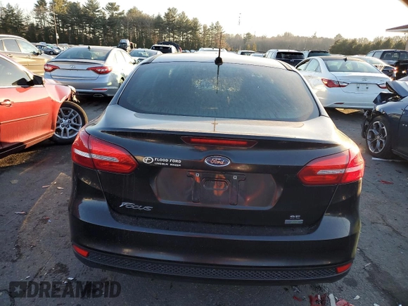2018 Ford Focus SE with VIN 1FADP3FE5JL298004, listed as a Copart auction lot 89244705 with 0 mi miles and Salvage Title. Bid and sale history available at carsss.com. Image 7.