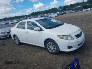2009 Toyota Corolla with VIN JTDBL40E199019510, listed as a IAAI auction lot 40471286 with 99,818 mi miles. Bid and sale history available at carsss.com. Image 1.