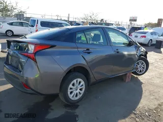 2020 Toyota Prius L Eco with VIN JTDKARFU8L3105988, listed as a IAAI auction lot 41688339 with 66,660 mi miles. Bid and sale history available at carsss.com. Image 4.