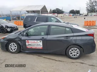 2022 Toyota Prius L Eco with VIN JTDKAMFU3N3190079, listed as a IAAI auction lot 41771356 with 52,607 mi miles and . Bid and sale history available at DreamBid. Image 14.