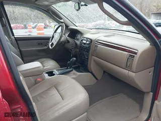 2004 Jeep Grand Cherokee Limited with VIN 1J4GW58S94C299311, listed as a IAAI auction lot 41912467 with 55,736 mi miles. Bid and sale history available at carsss.com. Image 5.