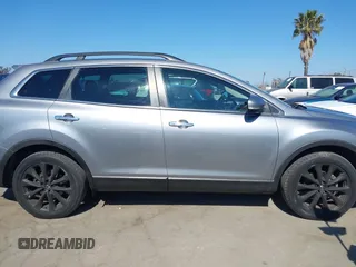 2014 Mazda CX-9 Grand Touring z VIN JM3TB3DV9E0437380, wystawiony jako IAAI lot #42298066 z przebiegiem 169 644 mil mil oraz . Historia ofert i sprzedaży dostępna na DreamBid. Obrazek 13.