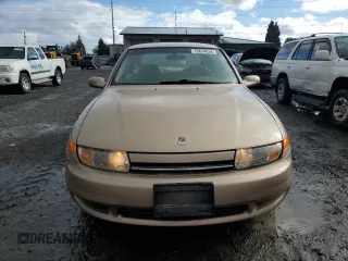 2002 Saturn LS z VIN 1G8JW54R52Y513297, wystawiony jako Copart lot #70874034 z przebiegiem 120 567 mil mil oraz Tytuł czysty. Historia ofert i sprzedaży dostępna na DreamBid. Obrazek 5.