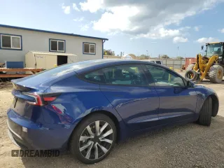 2024 Tesla Model 3 with VIN 5YJ3E1EA4RF798460, listed as a Copart auction lot 88345085 with 3,655 mi miles and Salvage Title. Bid and sale history available at carsss.com. Image 3.