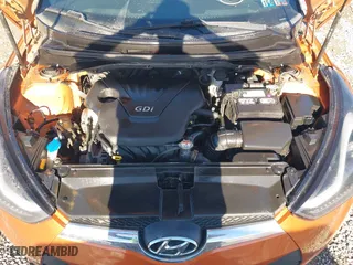 2015 Hyundai Veloster with VIN KMHTC6AD2FU225073, listed as a IAAI auction lot 41571336 with 128,819 mi miles. Bid and sale history available at carsss.com. Image 10.