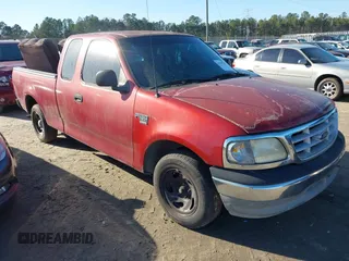 1999 Ford F-150 with VIN 1FTRX17WXXNA51165, listed as a IAAI auction lot 41707795 with Not Provided miles and . Bid and sale history available at DreamBid. Image 1.