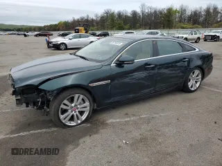 2018 Jaguar XJ Portfolio with VIN SAJWJ2GD9J8W15663, listed as a Copart auction lot 56734515 with 9,374 mi miles and Salvage Title. Bid and sale history available at DreamBid. Image 1.