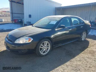 2015 Chevrolet Impala Limited LTZ with VIN 2G1WC5E31F1162663, listed as a IAAI auction lot 41457571 with 239,363 mi miles. Bid and sale history available at carsss.com. Image 2.