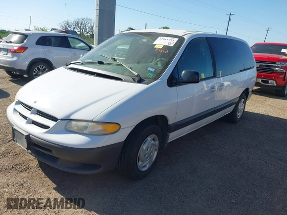 1999 Dodge Caravan SE with VIN 1B4GP44G7XB561333, listed as a IAAI auction lot 42011411 with Not Provided miles and . Bid and sale history available at carsss.com. Image 2.