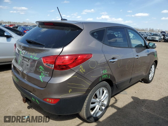 2010 Hyundai Tucson GLS with VIN KM8JU3AC8AU056499, listed as a Copart auction lot 53057365 with 119,906 mi miles and Salvage Title. Bid and sale history available at DreamBid. Image 3.