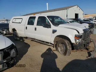 2010 Ford Super Duty F-250 SRW XL with VIN 1FTSW2B58AEA99988, listed as a Copart auction lot 74097294 with 266,928 mi miles and Salvage Title. Bid and sale history available at carsss.com. Image 4.