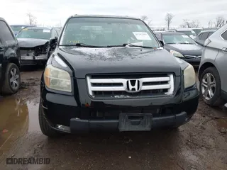 2007 Honda Pilot EX-L with VIN 5FNYF28557B028997, listed as a IAAI auction lot 41742267 with 217,114 mi miles. Bid and sale history available at carsss.com. Image 12.