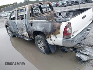 2014 Toyota Tacoma PreRunner with VIN 3TMJU4GNXEM163647, listed as a IAAI auction lot 41422577 with 1 mi miles. Bid and sale history available at carsss.com. Image 3.