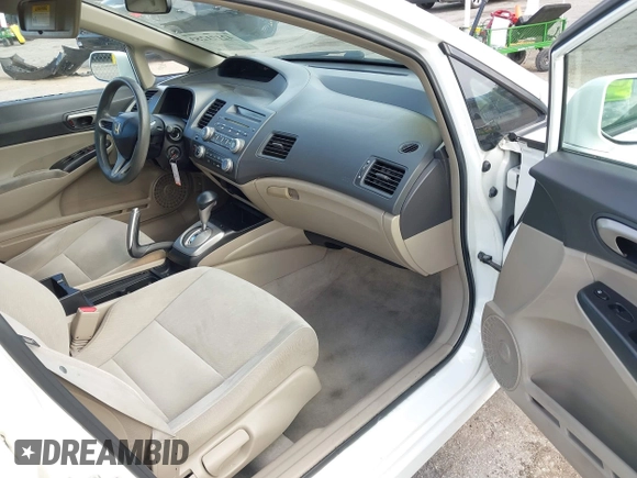 2010 Honda Civic LX with VIN 2HGFA1F54AH533810, listed as a IAAI auction lot 42171253 with 211,551 mi miles and . Bid and sale history available at DreamBid. Image 5.