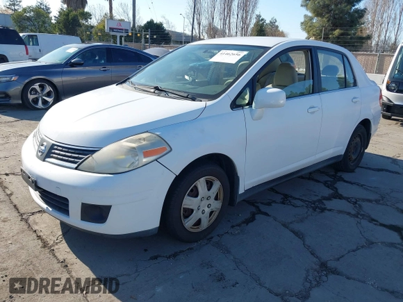 2007 Nissan Versa 1.8 SL with VIN 3N1BC11EX7L460203, listed as a IAAI auction lot 41462656 with 160,142 mi miles. Bid and sale history available at carsss.com. Image 2.
