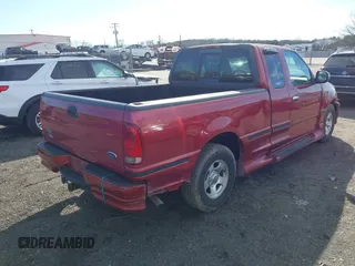 2000 Ford F-150 XL with VIN 2FTRX17W2YCA79002, listed as a IAAI auction lot 41605570 with 322,154 mi miles. Bid and sale history available at carsss.com. Image 4.