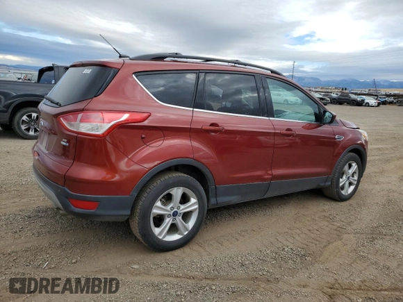 2015 Ford Escape SE with VIN 1FMCU9GX6FUC67715, listed as a Copart auction lot 73495244 with 184,183 mi miles and Salvage Title. Bid and sale history available at DreamBid. Image 3.
