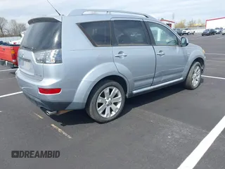 2008 Mitsubishi Outlander SE z VIN JA4LT31W28Z012886, wystawiony jako IAAI lot #41867742 z przebiegiem 207 481 mil mil oraz . Historia ofert i sprzedaży dostępna na DreamBid. Obrazek 4.