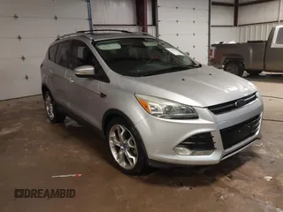 2013 Ford Escape Titanium z VIN 1FMCU0J94DUA93128, wystawiony jako IAAI lot #41612072 z przebiegiem 174 274 mil mil oraz . Historia ofert i sprzedaży dostępna na DreamBid. Obrazek 1.