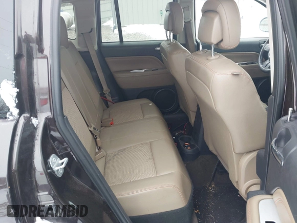 2014 Jeep Compass Latitude with VIN 1C4NJDEB1ED762578, listed as a IAAI auction lot 41244333 with 145,085 mi miles and . Bid and sale history available at carsss.com. Image 8.