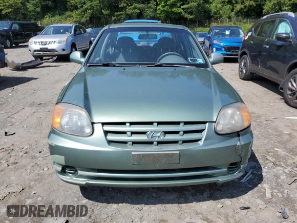2005 Hyundai Accent GLS with VIN KMHCG45C35U622963, listed as a Copart auction lot 68292114 with 137,655 mi miles and Salvage Title. Bid and sale history available at carsss.com. Image 5.