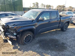 2024 Toyota Tacoma 4WD SR5 with VIN 3TMLB5JN8RM022627, listed as a IAAI auction lot 41245795 with 6,752 mi miles. Bid and sale history available at carsss.com. Image 17.
