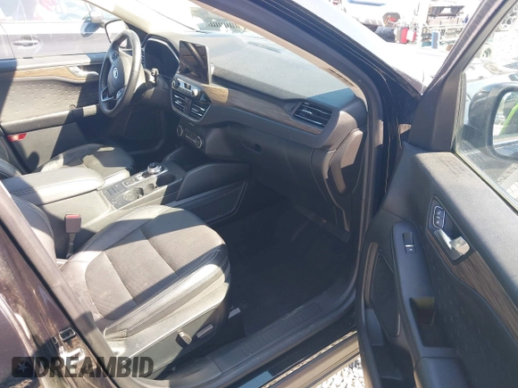 2020 Ford Escape Titanium Hybrid z VIN 1FMCU9DZ9LUC35844, wystawiony jako IAAI lot #42058275 z przebiegiem 74 205 mil mil oraz . Historia ofert i sprzedaży dostępna na DreamBid. Obrazek 5.