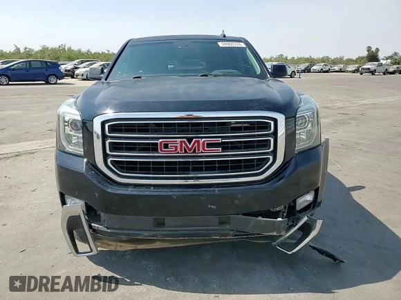2016 GMC Yukon SLT with VIN 1GKS1BKCXGR122111, listed as a Copart auction lot 69900124 with 73,781 mi miles and Salvage Title. Bid and sale history available at carsss.com. Image 11.