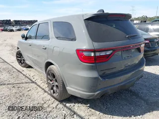 2023 Dodge Durango SRT Hellcat Premium with VIN 1C4SDJH95PC695459, listed as a IAAI auction lot 41856168 with 6,163 mi miles and . Bid and sale history available at DreamBid. Image 3.