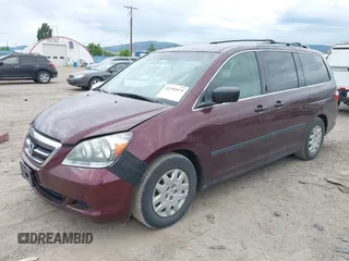 2007 Honda Odyssey LX with VIN 5FNRL38207B022095, listed as a IAAI auction lot 42395979 with 135,699 mi miles and . Bid and sale history available at DreamBid. Image 2.