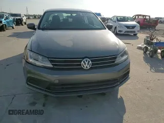 2017 Volkswagen Jetta S z VIN 3VW2B7AJ3HM401793, wystawiony jako Copart lot #65069265 z przebiegiem 85 610 mil mil oraz Szkoda całkowita • Salvage title. Historia ofert i sprzedaży dostępna na DreamBid. Obrazek 13.