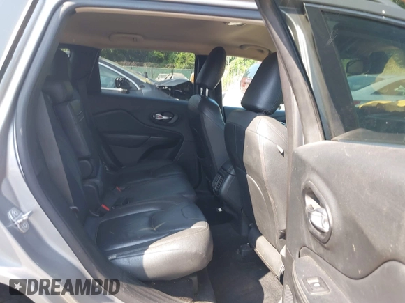 2015 Jeep Cherokee Latitude with VIN 1C4PJMCS2FW789144, listed as a IAAI auction lot 42837222 with 99,759 mi miles and . Bid and sale history available at DreamBid. Image 8.