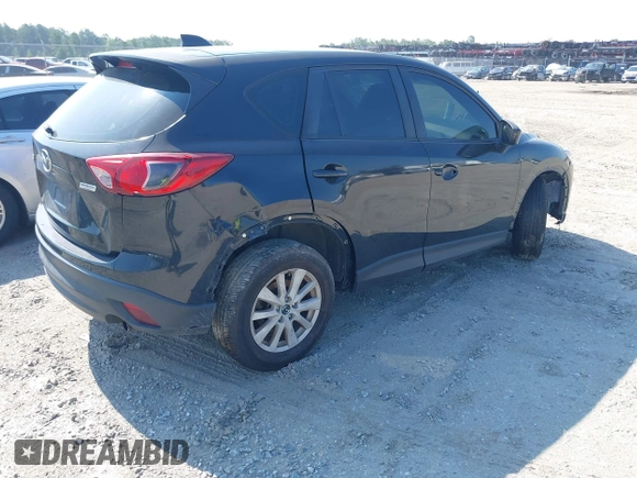 2014 Mazda CX-5 Sport z VIN JM3KE2BE2E0325715, wystawiony jako IAAI lot #42683243 z przebiegiem 262 005 mil mil oraz . Historia ofert i sprzedaży dostępna na DreamBid. Obrazek 4.