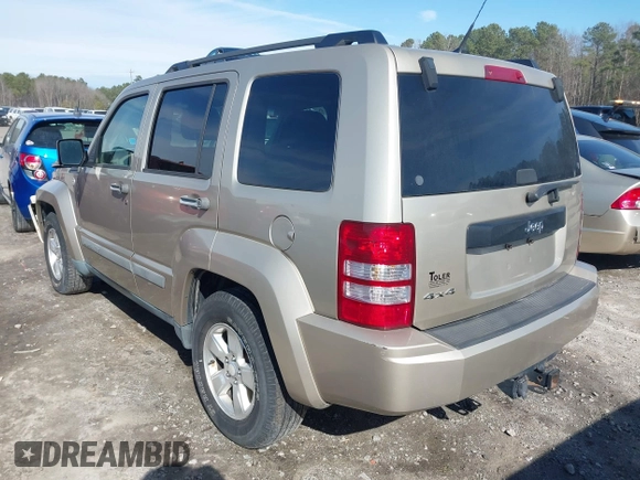2011 Jeep Liberty Sport Jet with VIN 1J4PN2GK8BW529905, listed as a IAAI auction lot 41600214 with 169,199 mi miles and . Bid and sale history available at carsss.com. Image 3.